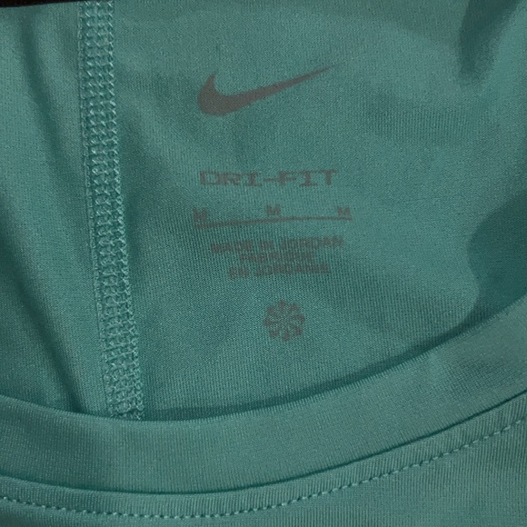 Nike bundle. 2 size M tanks and 1 size S sports bra. New condition. - Picture 2 of 5